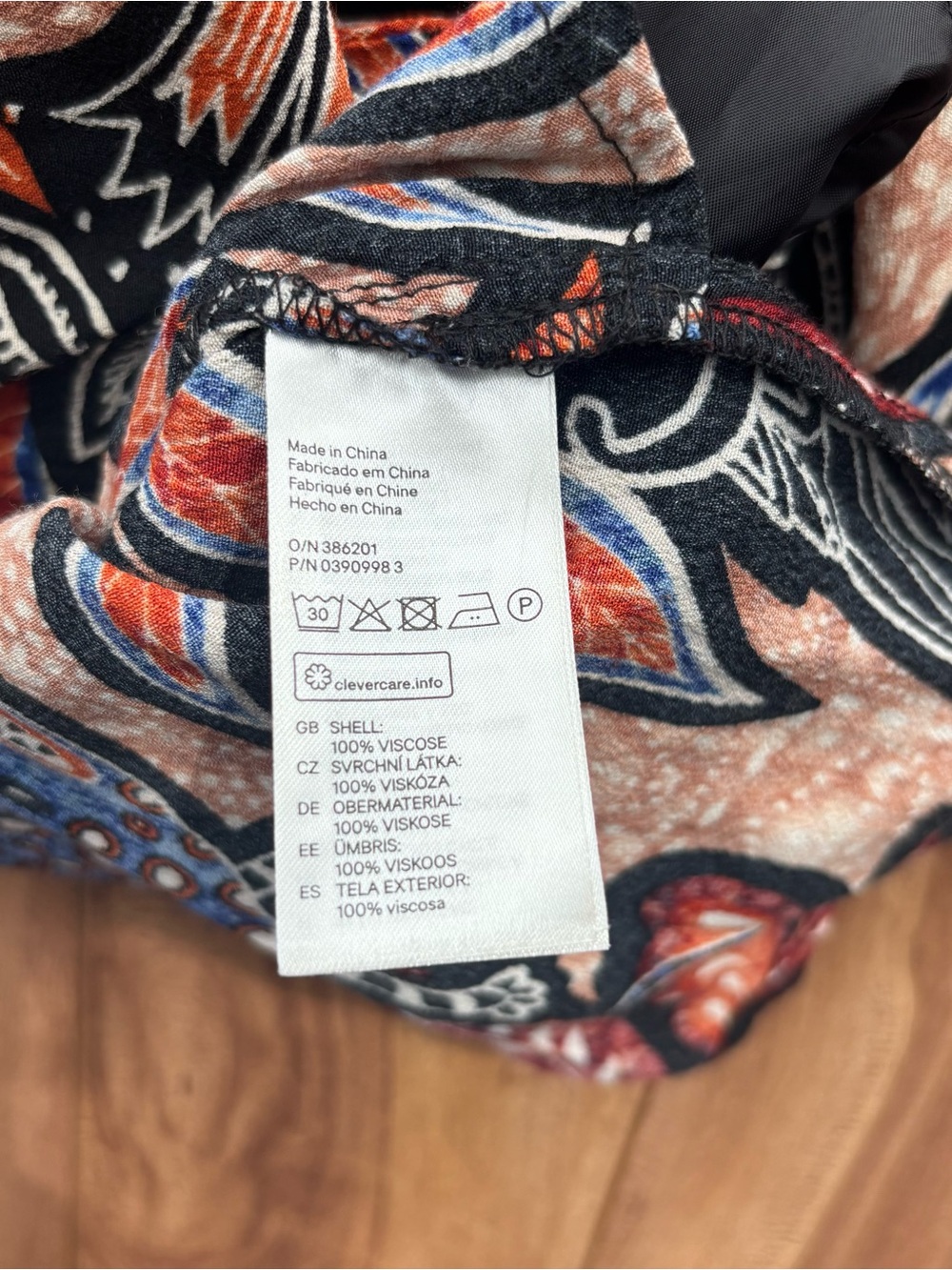 Vibrant Leaf Print Long Sleeve Romper in Black & Rust - Picture 5 of 7